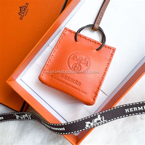 hermes orange bag charm